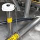 White dust cap with chain in use